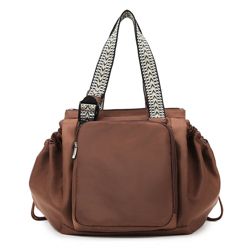 sac a langer fourre tout brun elegant