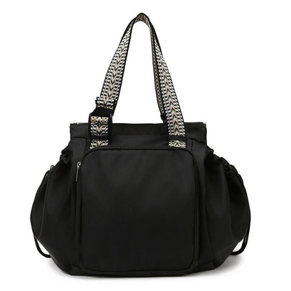 sac a langer fourre tout noir elegant et chic